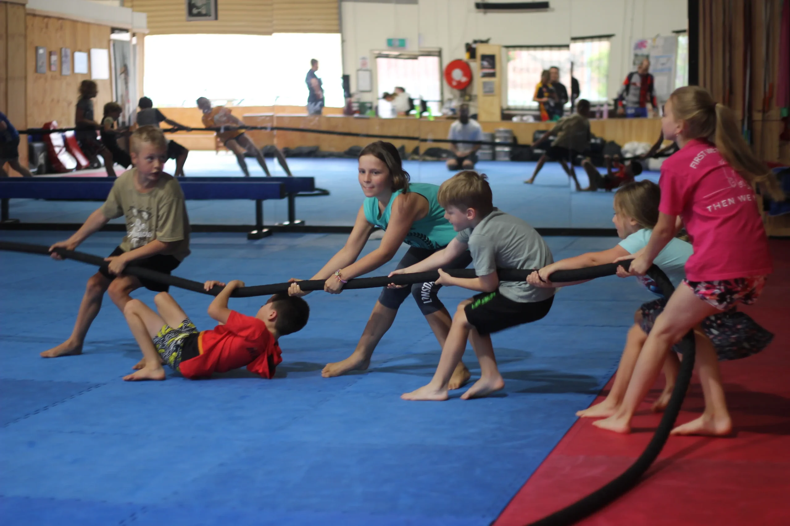 • Kids engaging in teamwork during functional fitness activities in Melbourne