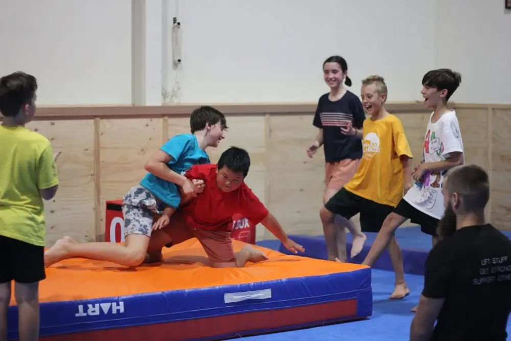 Self-defense class during kids functional fitness class in Eltham Australia.