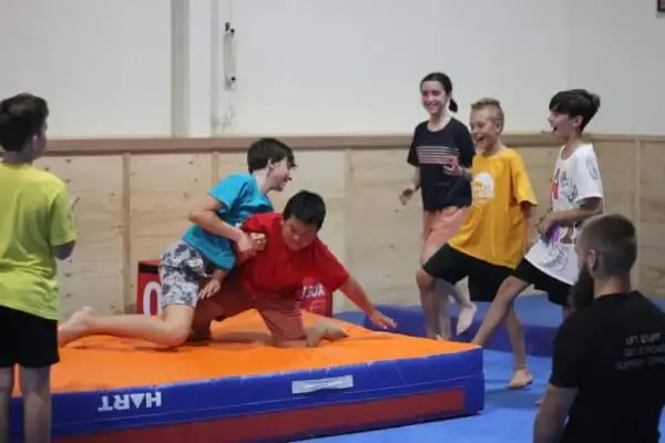 children smiling during a fun fitness game in class in eltham australia