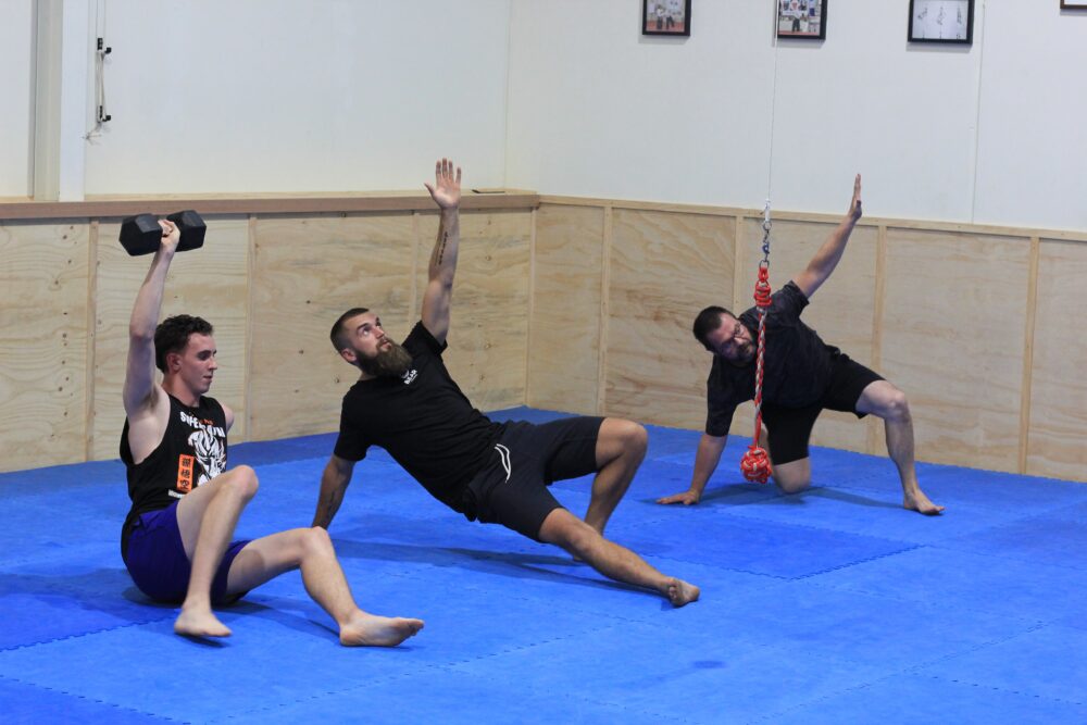 participants performing functional movements in a group training session at functional fitness eltham