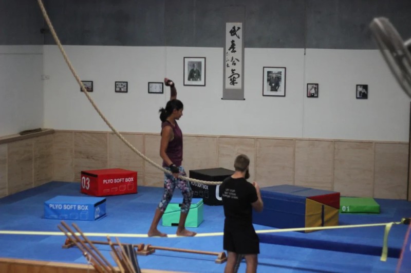 personal trainer guiding a client on balance exercises at functional fitness eltham